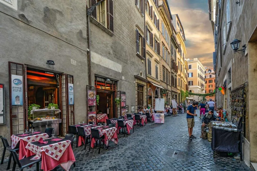 Rome street scene with outdoor dining, lively