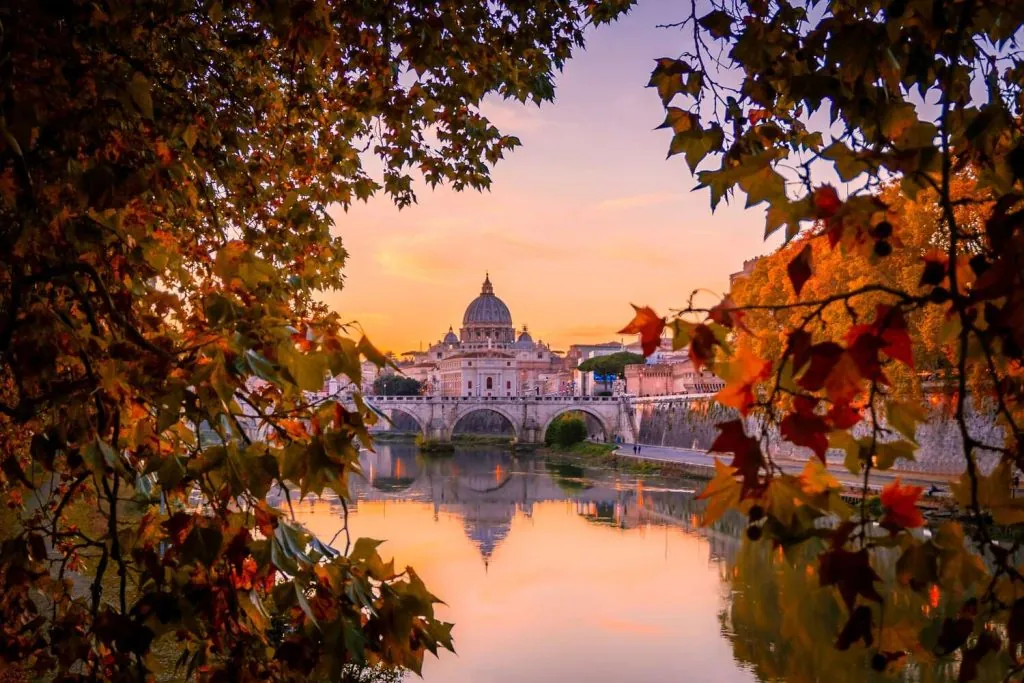 Sunset over Vatican City, reflective water views in Rome in August