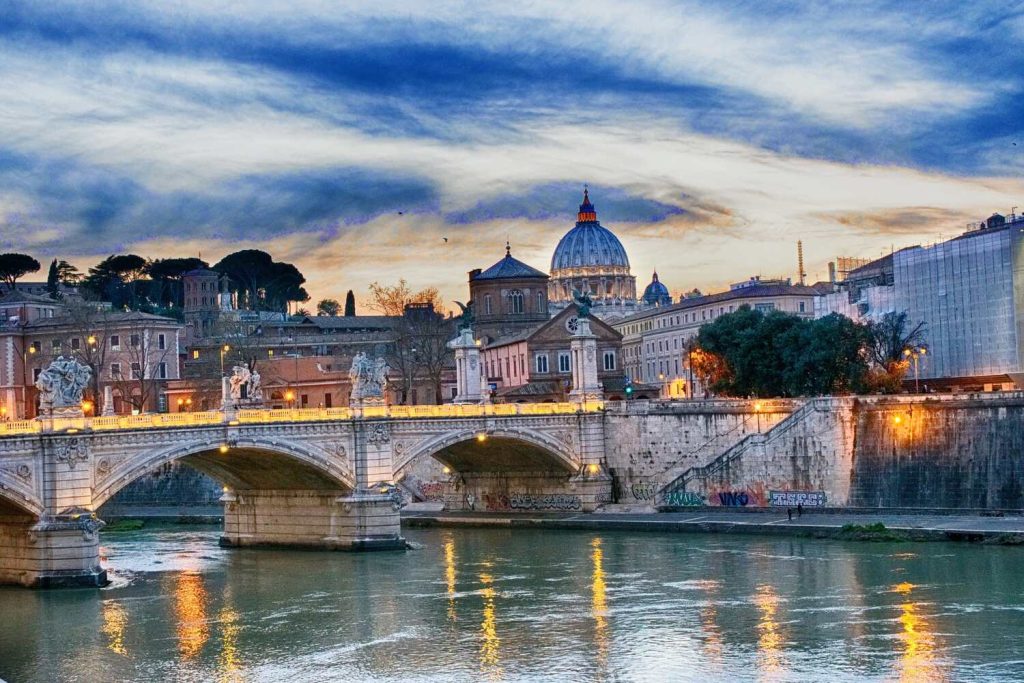 Reflective Tiber River with St. Peter's Basilica in Rome in October